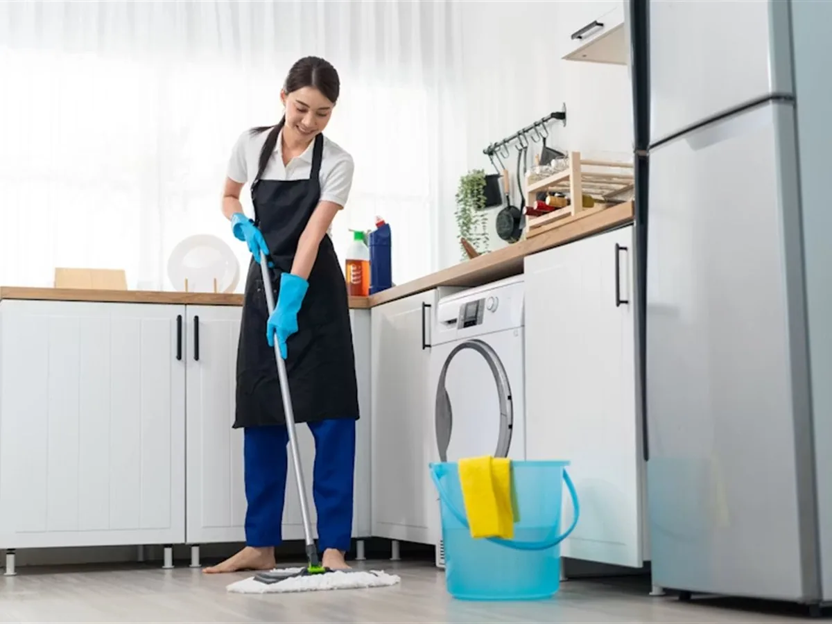 Professional cleaner working in a client home