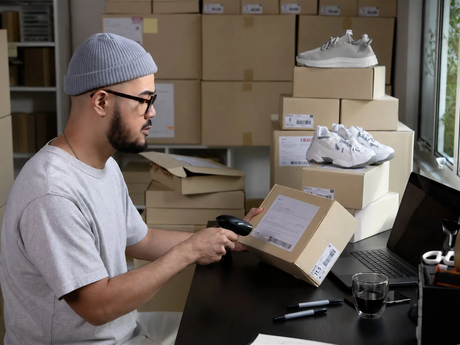 E-commerce owner packing customer orders